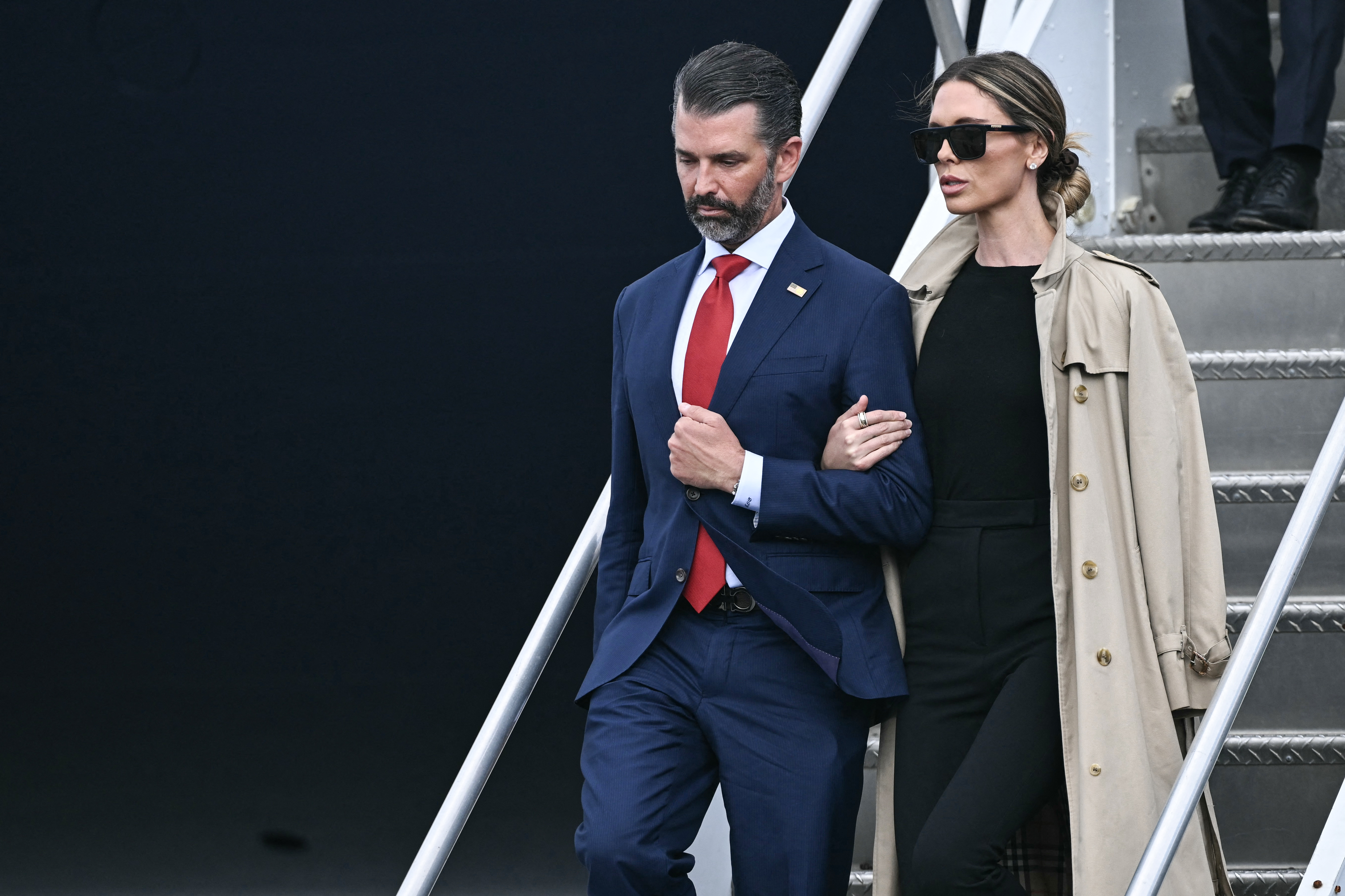 Donald Trump Jr. and his wife Bettina (R) disembark from Air Force One as they arrive with US President Donald Trump at Shannon Airport in Shannon, western Ireland on September 12, 2026