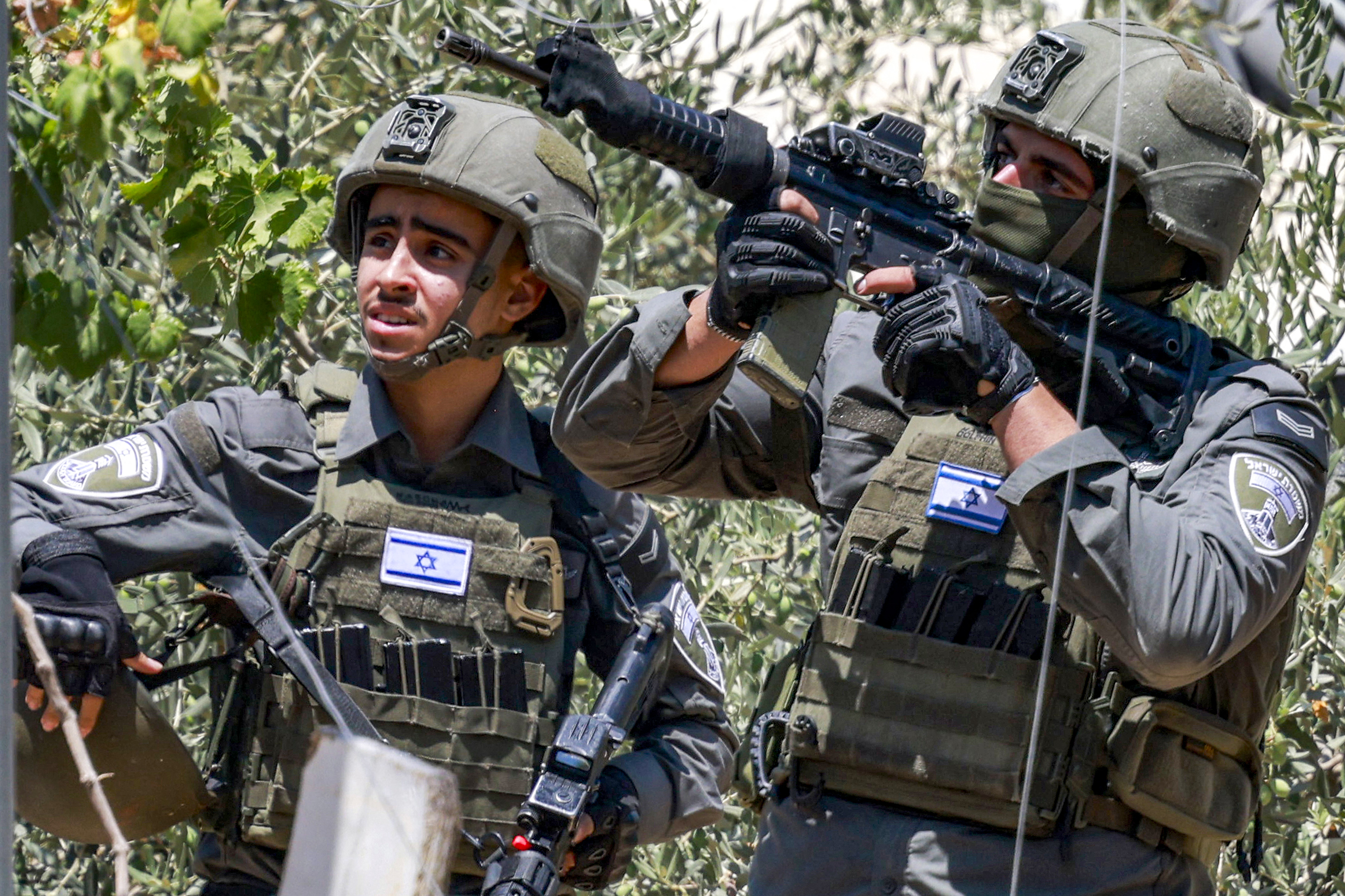 An Israeli army soldier aims a rifle during a military operation in the village of Salem, east of Nablus in the occupied West Bank, on August 2, 2026.