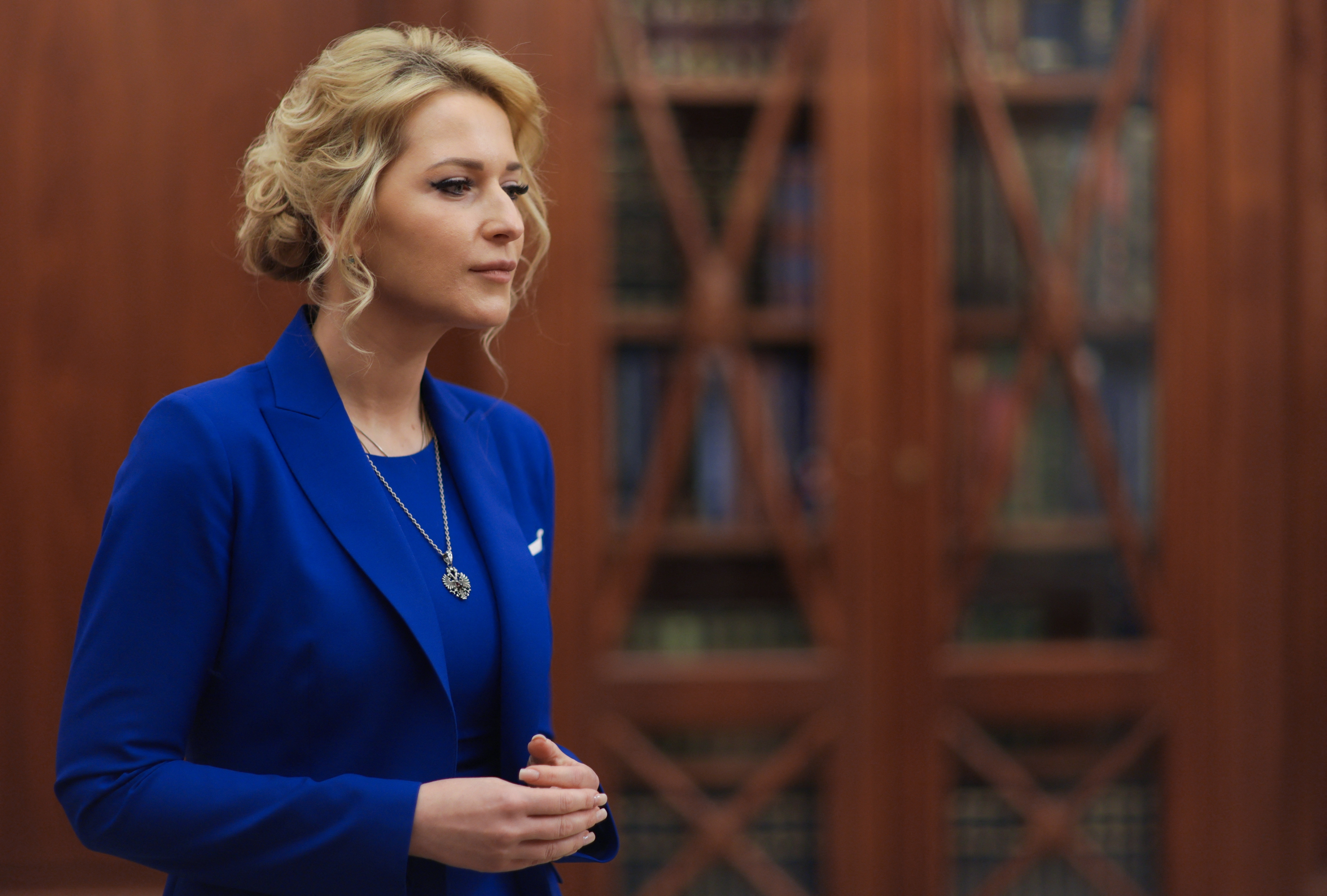 In this pool photograph distributed by the Russian state agency Sputnik, Russia's human rights commissioner Yana Lantratova attends a meeting with Russian President at the Kremlin in Moscow