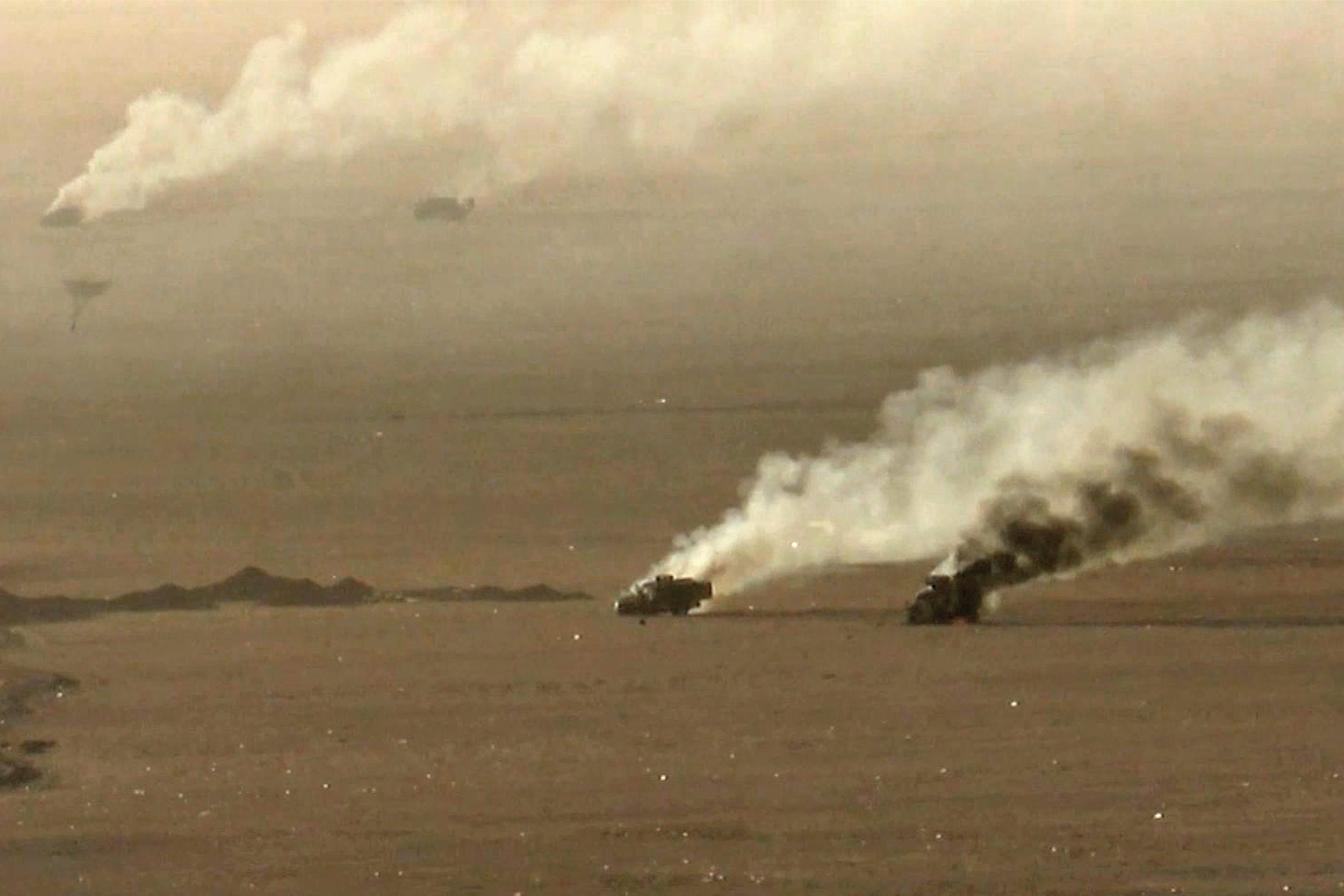This handout picture released on September 15, 2026 by Ansarullah Media Centre reportedly shows burning military vehicles that they targeted in al-Jawf.