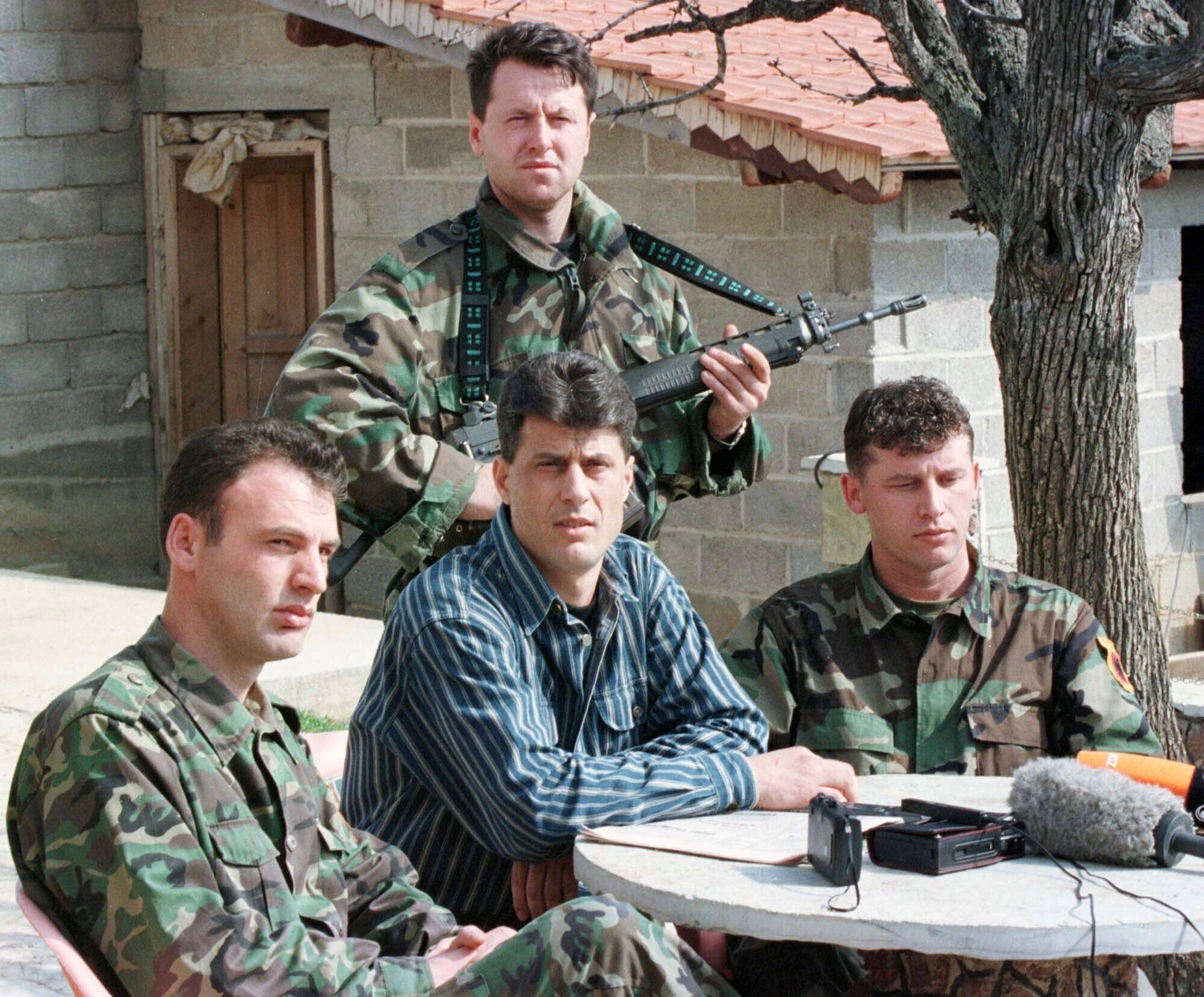 Hashim Thaci, head of the Kosovo Albanian negotiation team and head of the Kosovo Liberation Army political directorate, center, addresses a press conference in a secret location in central Kosovo(AP Photo/Visar Kryeziu, File)