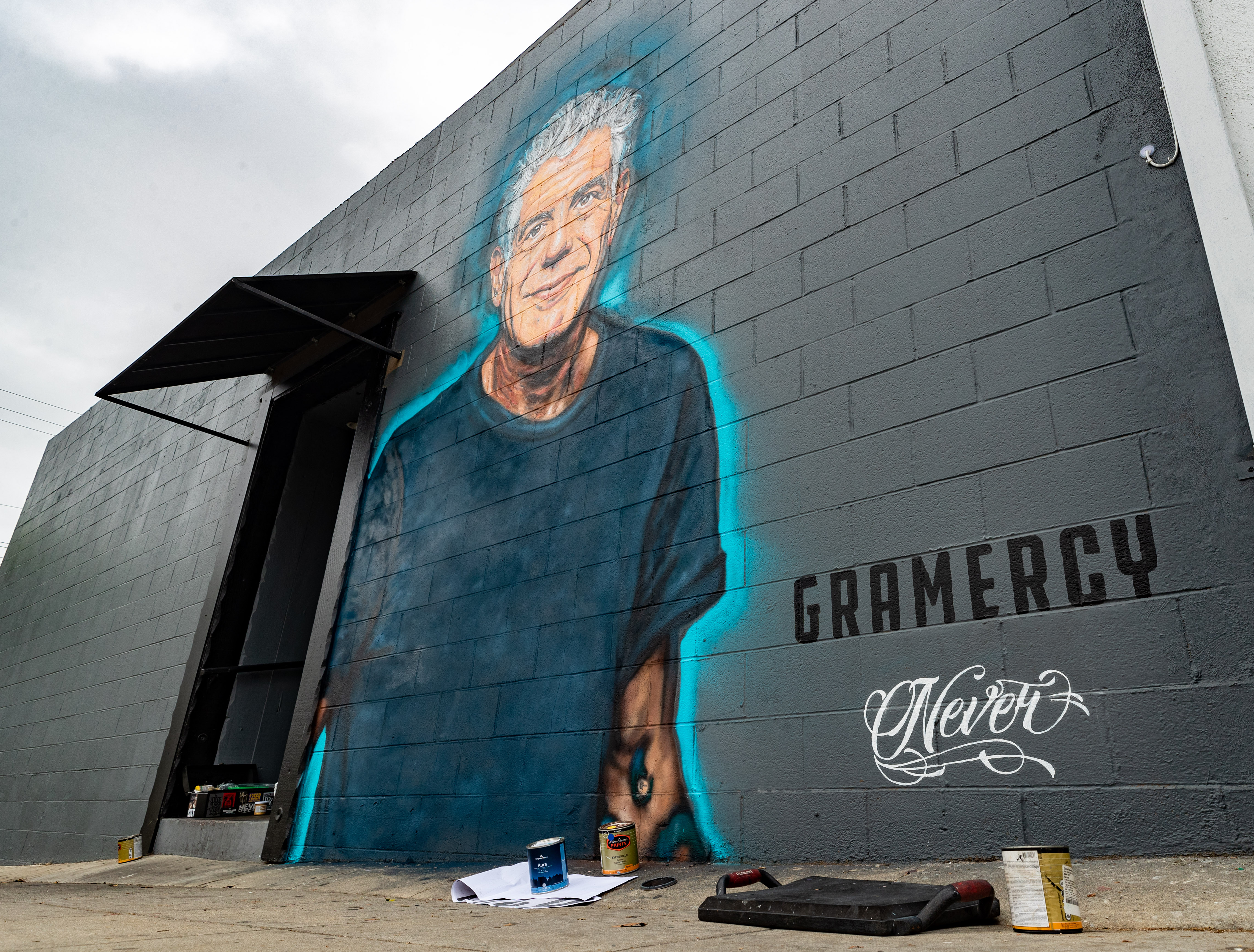 SANTA MONICA, CA - JUNE 16: Street Muralist Jonas Never's mural of Anthony Bourdain on the side wall of a new restaurant and bar called Gramercy on June 16, 2018 in Santa Monica, California.