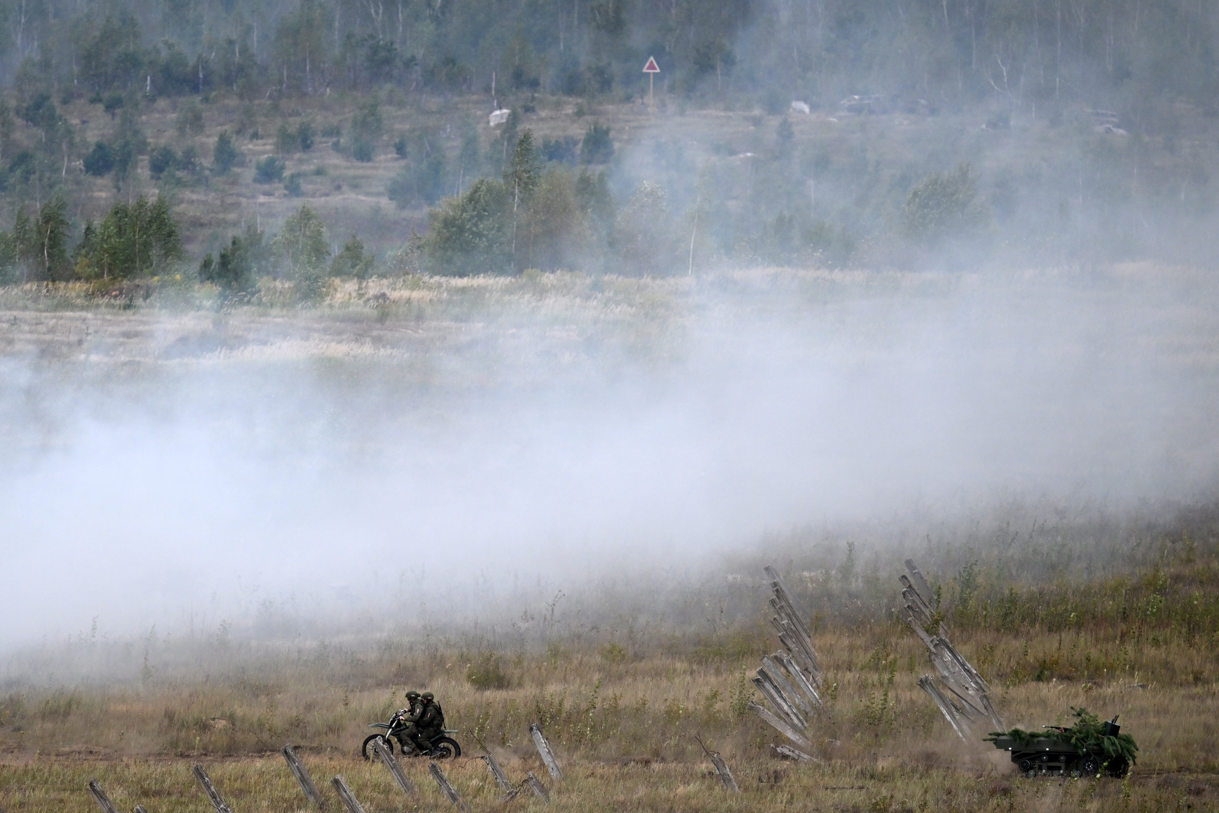 Servicemen take part in the "Zapad-2025" (West-2025) joint Russian-Belarusian military drills at a training ground near the town of Borisov, east of the capital Minsk, on September 15, 2025. (Photo by Olesya KURPYAYEVA / AFP)