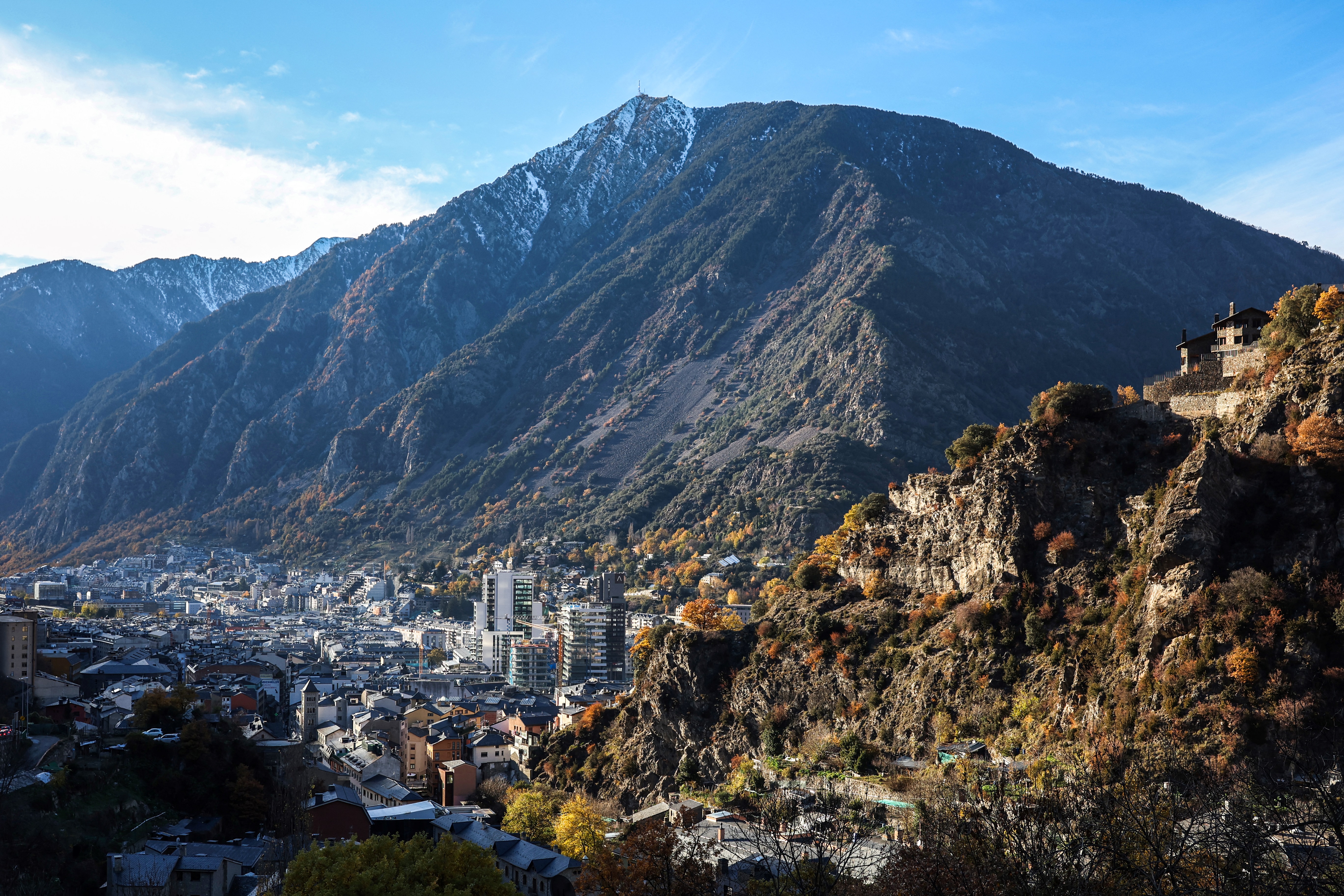 This photograph shows a general view of the city of Andorra la Vella in Andorra on November 30, 2022.)