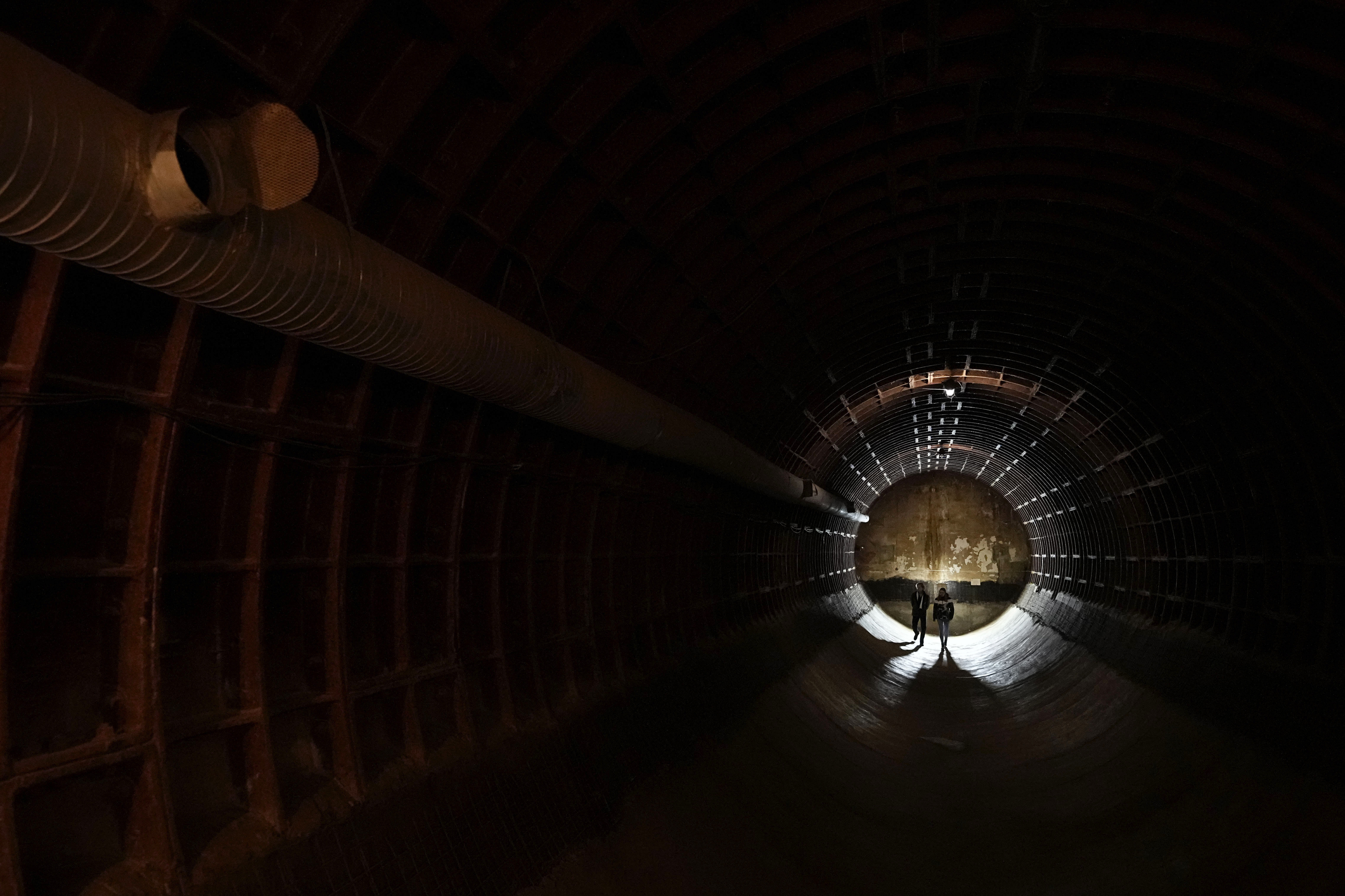 People tour the Bunker-703. (AP Photo/Pavel Bednyakov)