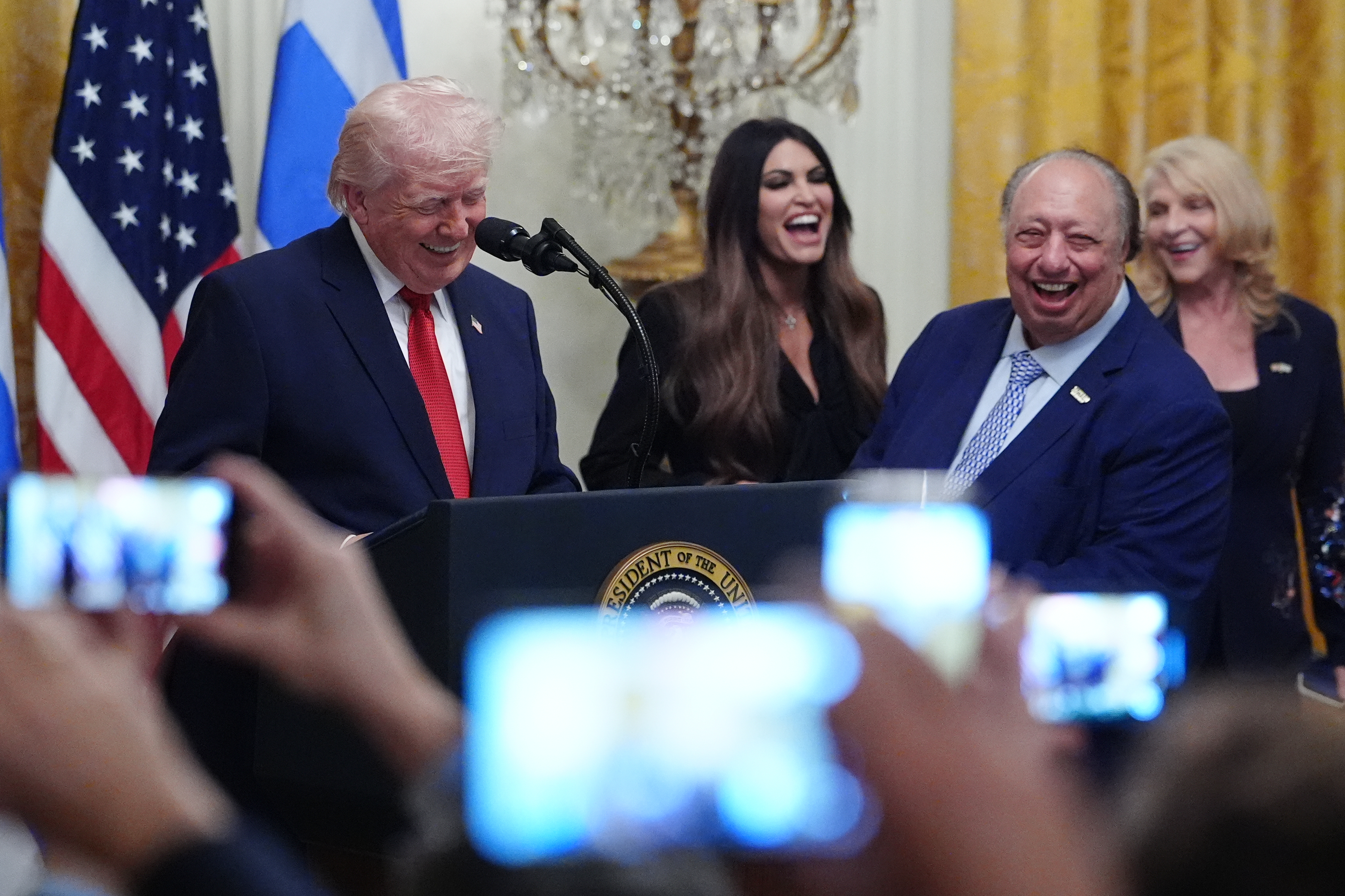 President Donald Trump smiles at a reception celebrating Greek Independence Day, in the East Room of the White House, Thursday, March 26, 2026, in Washington