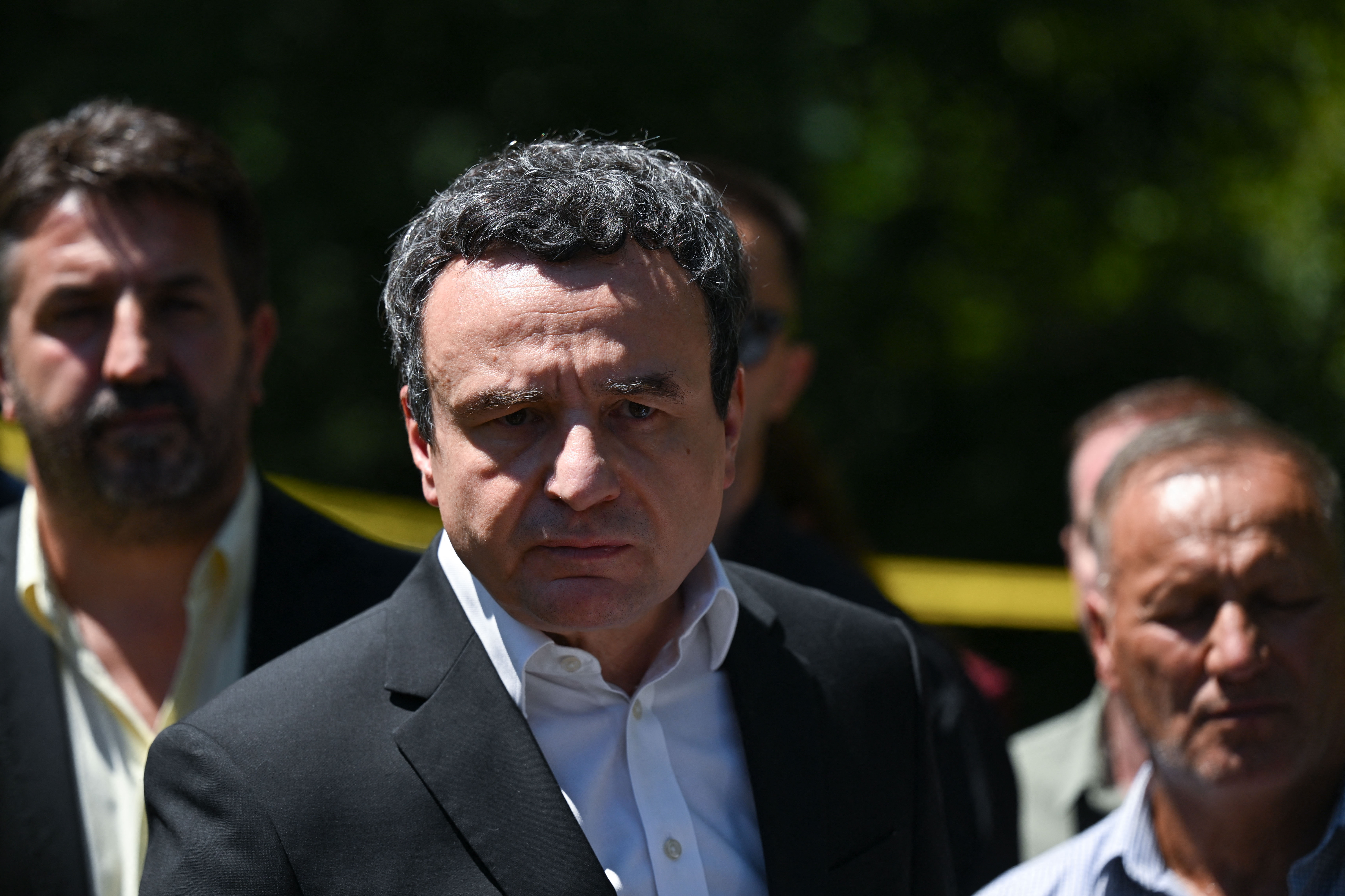Kosovo's Prime Minister Albin Kurti speaks to the media after visiting a newly discovered possible mass grave site in the village of Kalluder, near the town of Zubin Potok, on August 1, 2026.