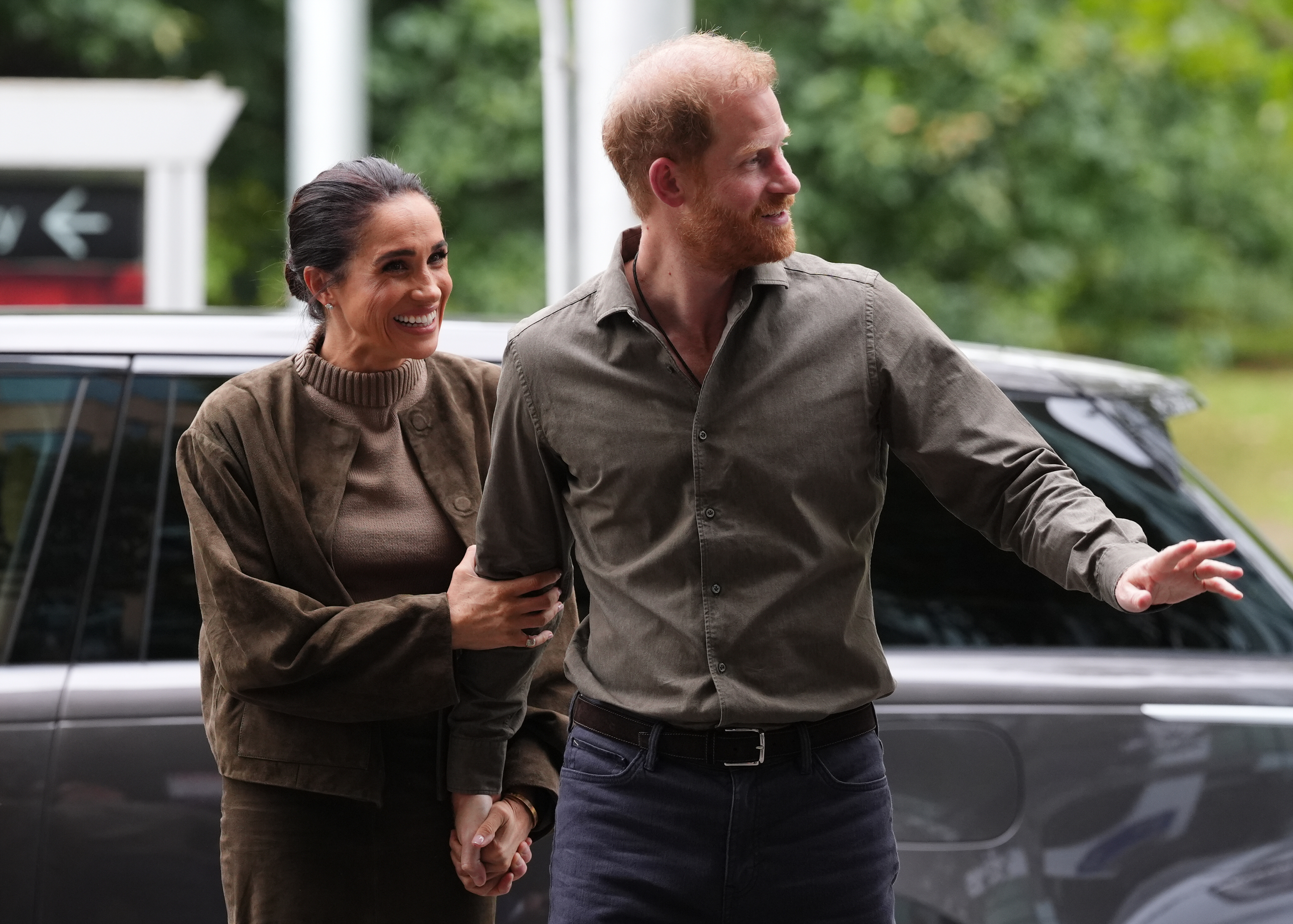 Prince Harry, right, and Meghan Markle. (Jonathan Brady/Pool Photo via AP)