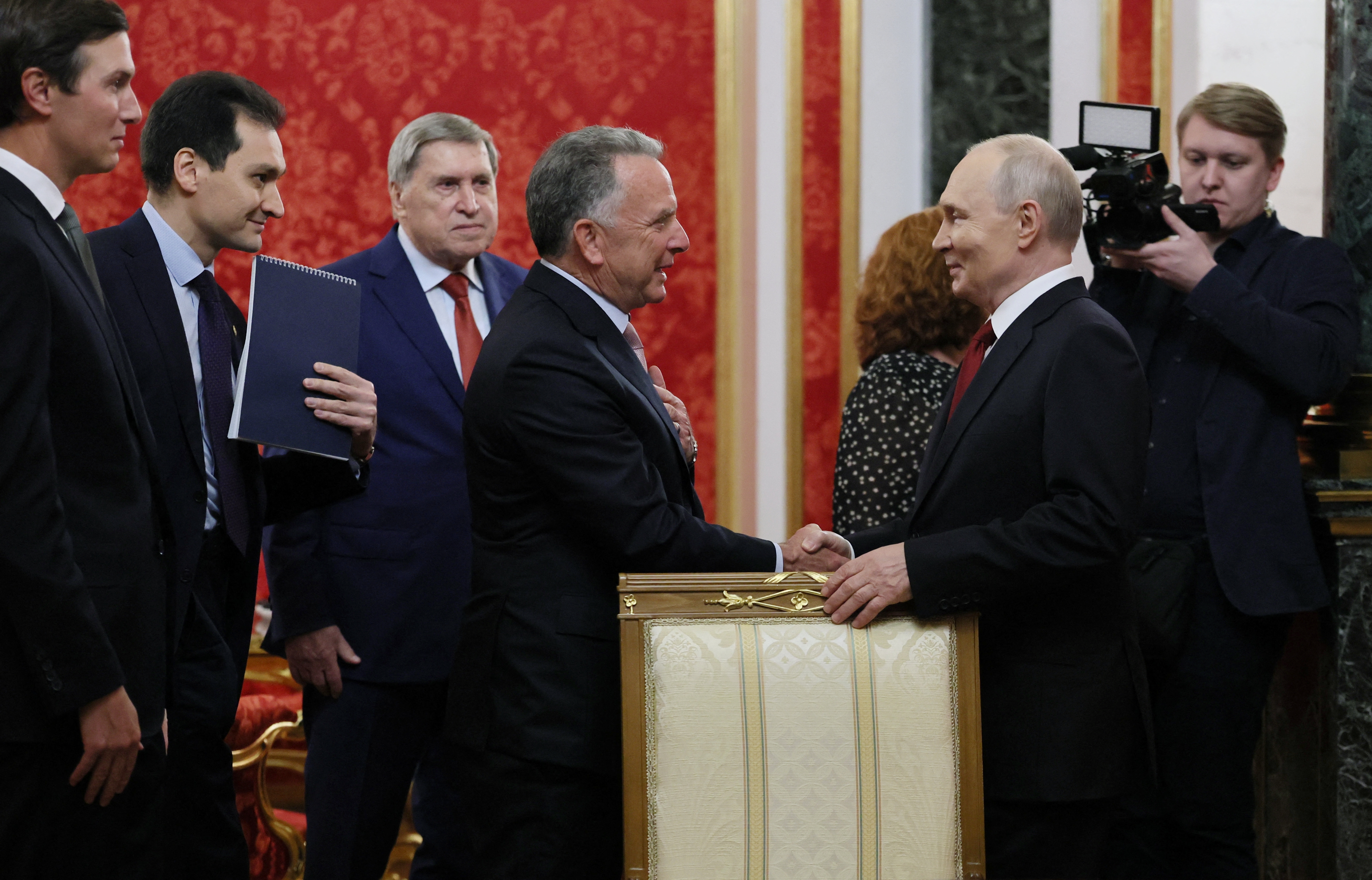 In this pool photograph distributed by the Russian state agency Sputnik, Russia's President Vladimir Putin (R) welcomes US special envoy Steve Witkoff (2nd R) and US President Donald Trump's son-in-law Jared Kushner