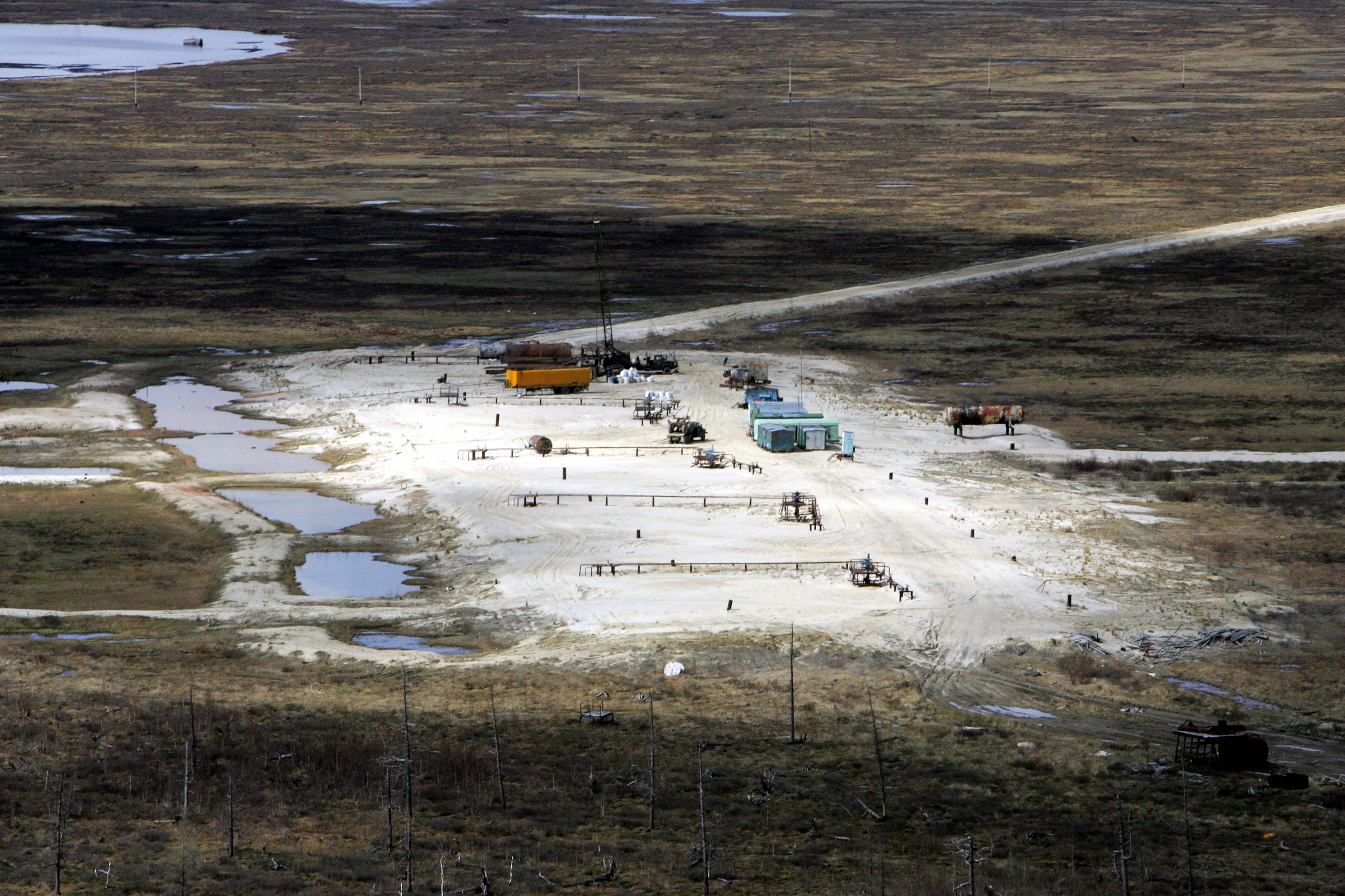 An aerial view of gaz fields not far from town of Novy Urengoy (Photo by MAXIM MARMUR / AFP)