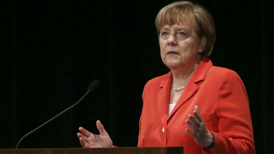 angela merkel tanjug ap Rob Griffith