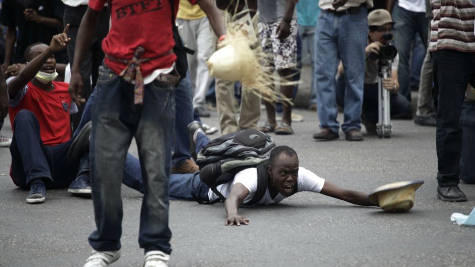 BeFunky_2015-02-14T031712Z_591627624_GM1EB2E0VA401_RTRMADP_3_HAITI-PROTESTS