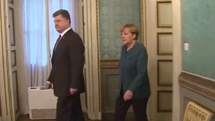 putin_porosenko_merkel_reuters