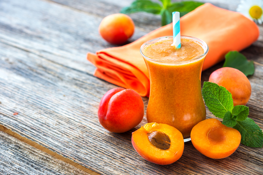 Fresh,Apricot,Smoothie,And,Apricots,On,Wooden,Background