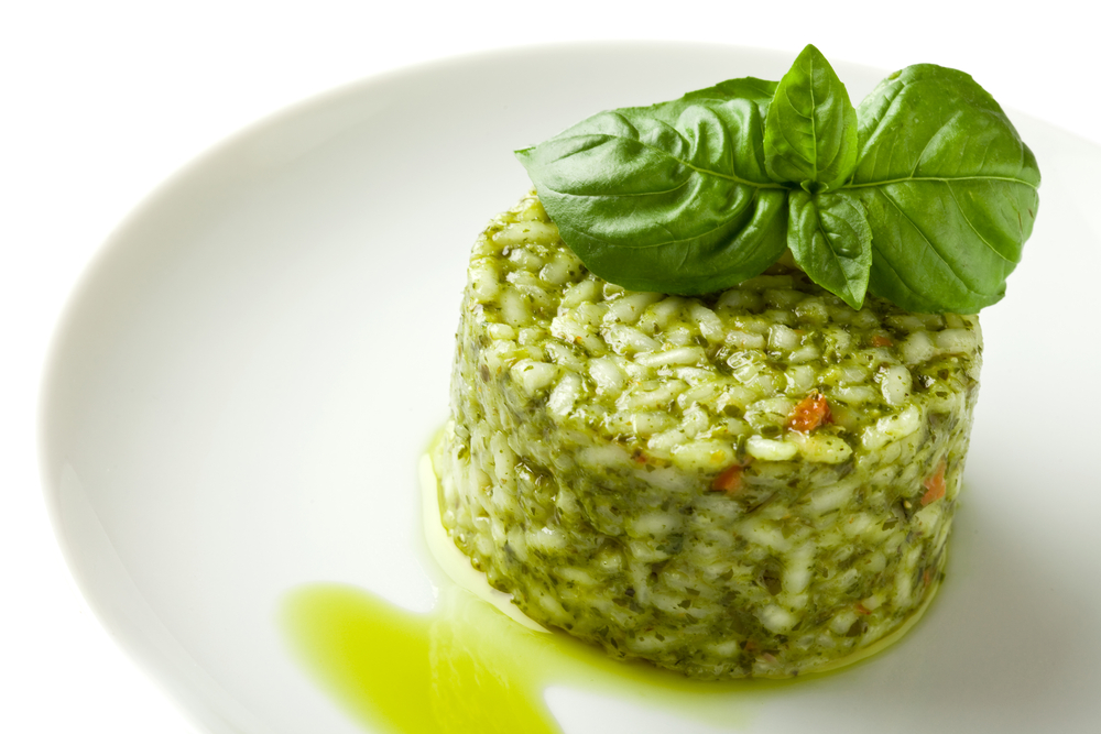 Photo,Of,Delicious,Risotto,With,Basil,On,White,Isolated,Background