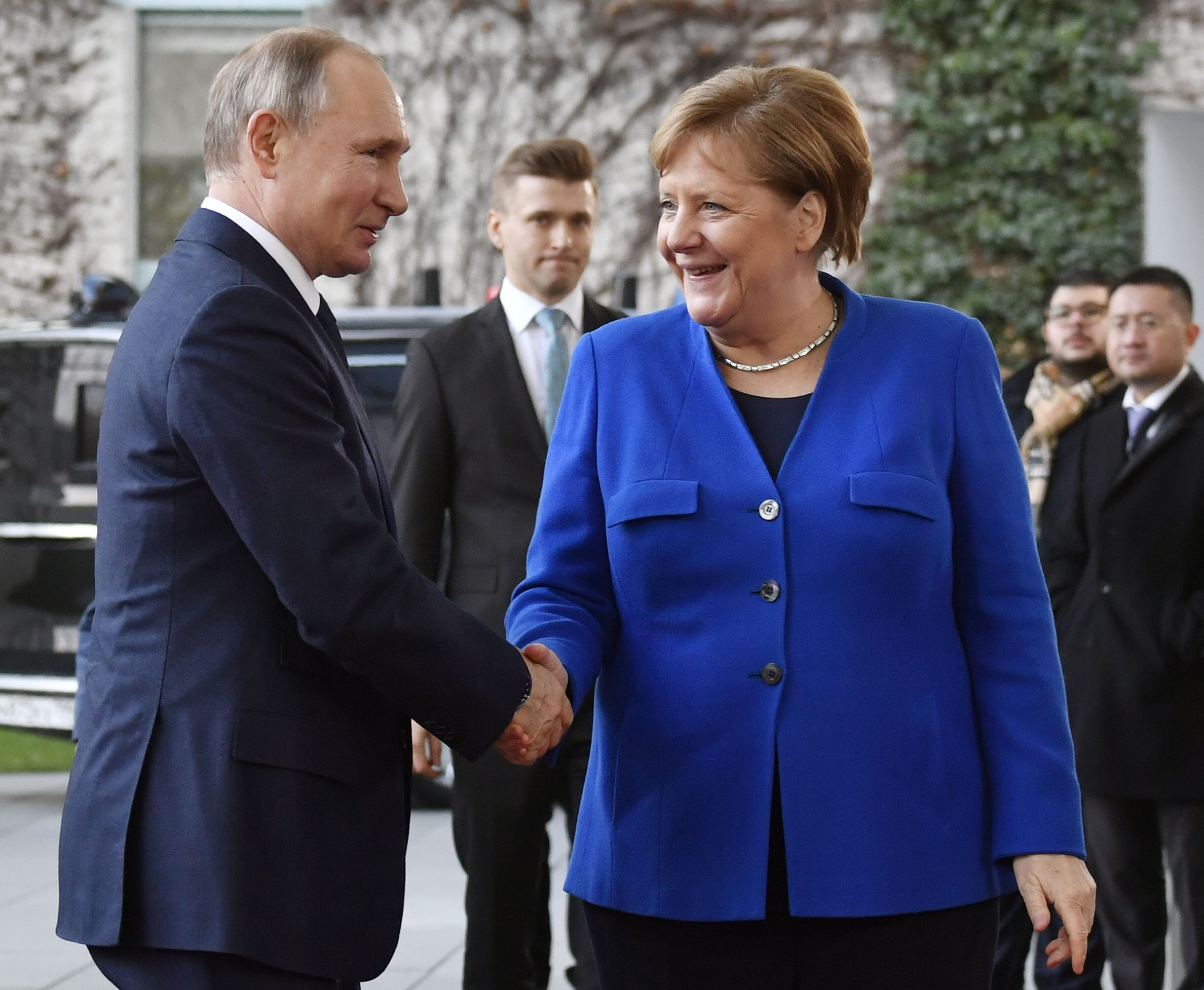 Vladimir Putin; Angela Merkel