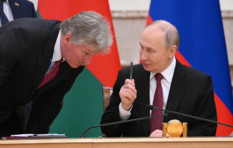 Dmitrij Peskov i Vladimir Putin